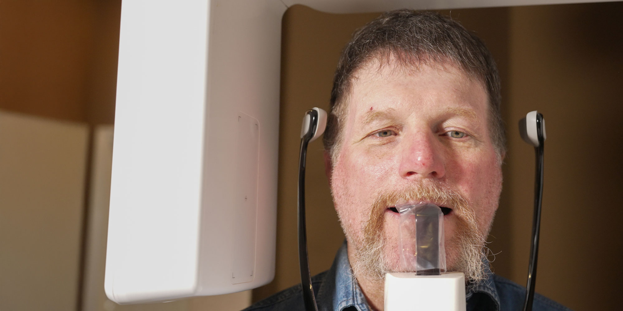 man undergoing cbct scan